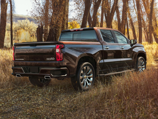 A black Chevy Silverado parked outside