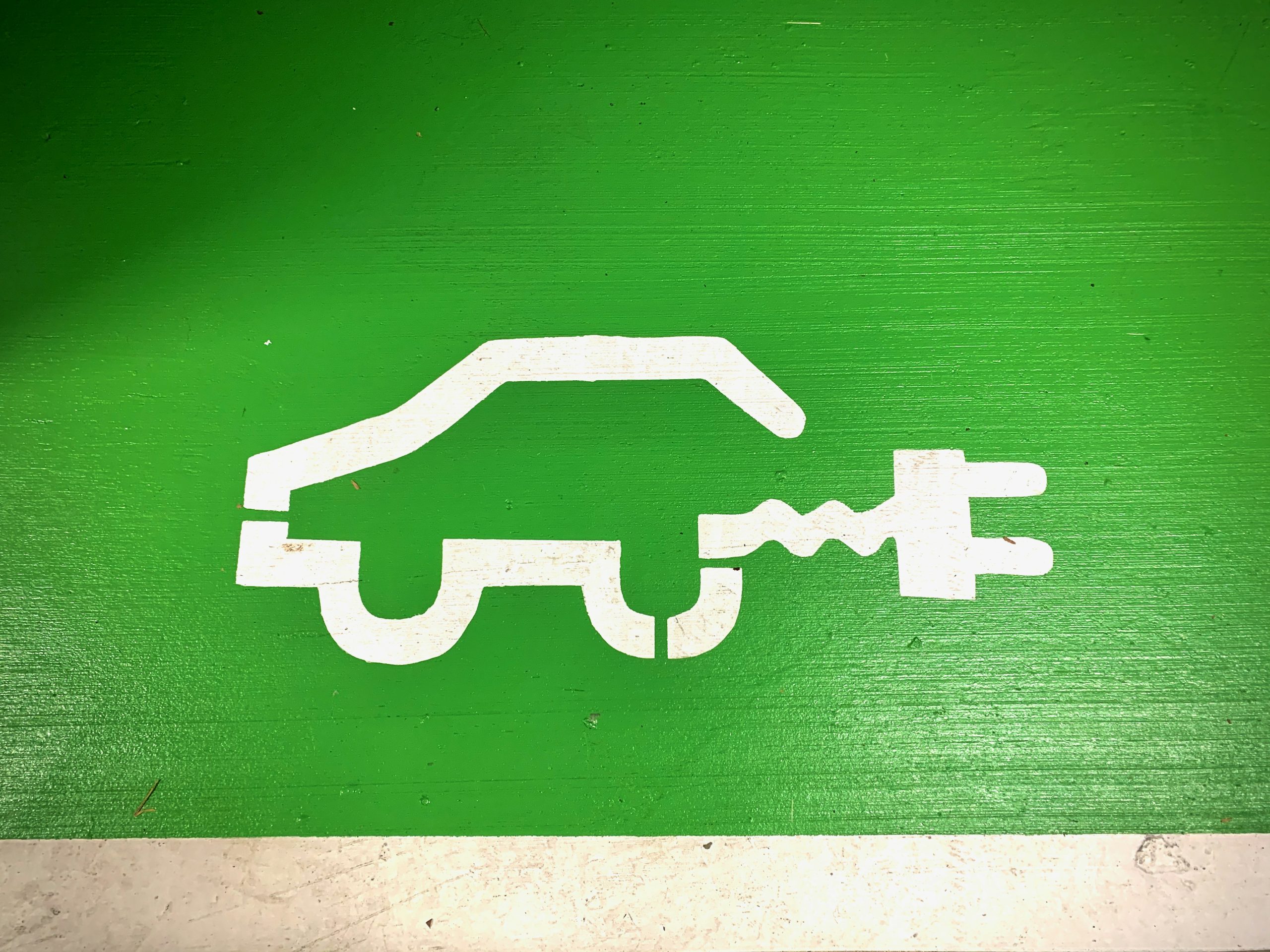 Painting of a car outline with a plug attached